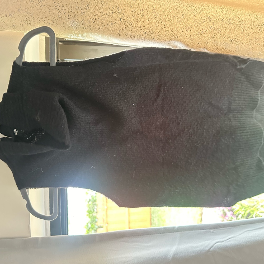 sleeveless mock neck sweater